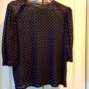 Navy and orange polka dot top. Puff 3/4 sleeve.